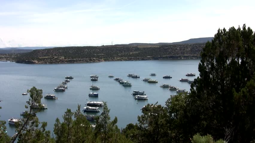 HD slow pan right to left across Navajo Lake and the marina on a summer morning in northern New Mexico