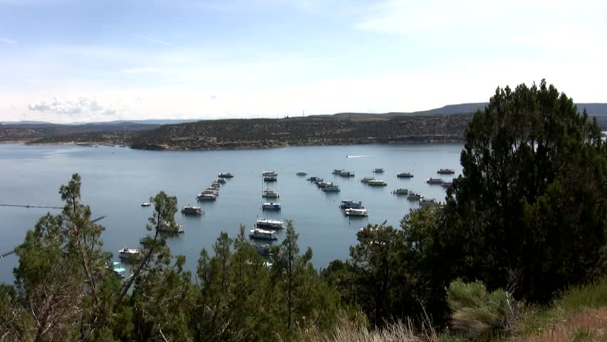 HD zoom in on a jet ski coming into the marina at Navajo Lake in northern New Mexico