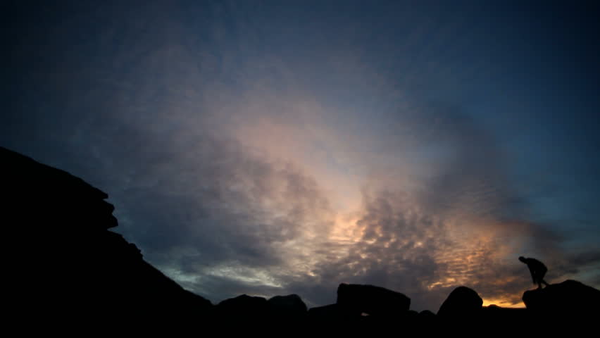 Worship, Wonder, Awe - Man marvels at Beautiful Sunset