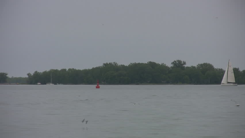 TORONTO, CANADA -?? JULY 2: Police boat passes by, Toronto, July 2, 2009. The Toronto Police marine unit is responsible for policing some 460 square miles of open water on Lake Ontario.