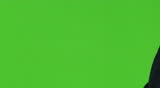 Businesswoman is shaking hands with a businessman - zoom out - green screen