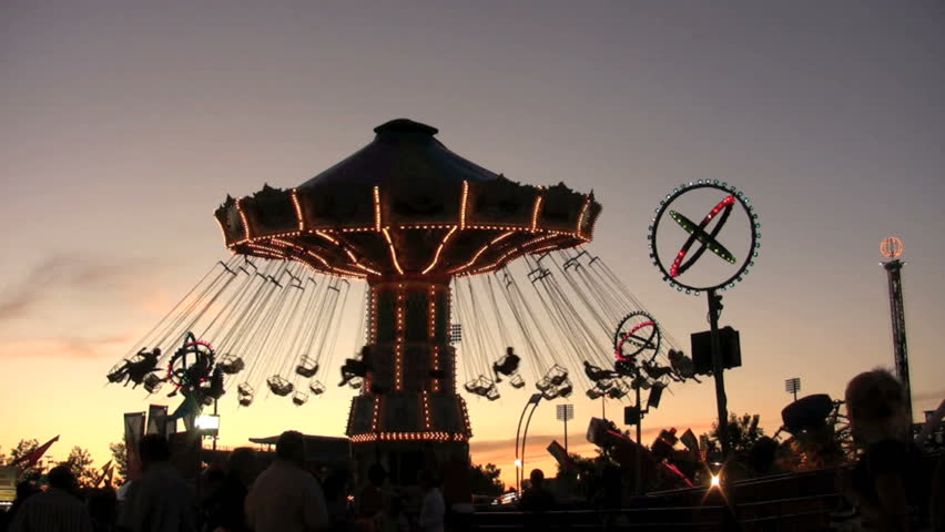 silhouetted amusement ride