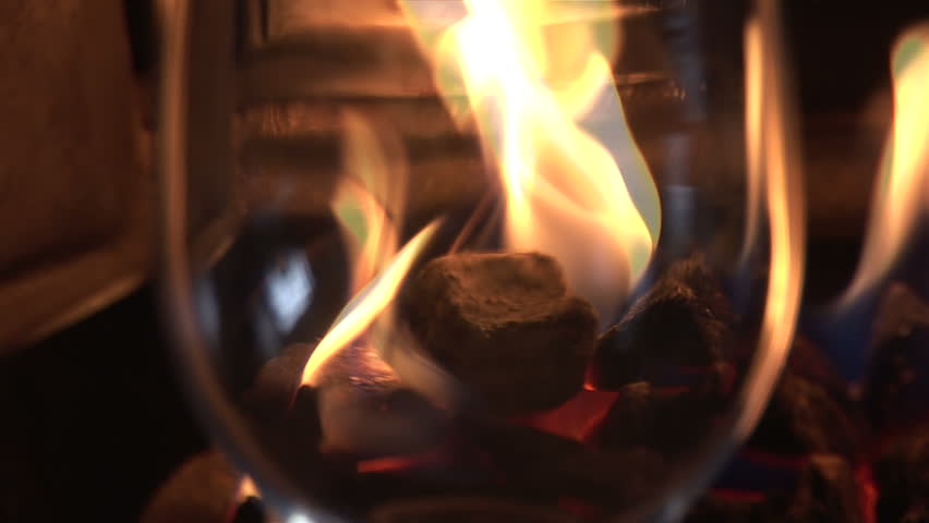 Red Wine Poured in Front of Fire