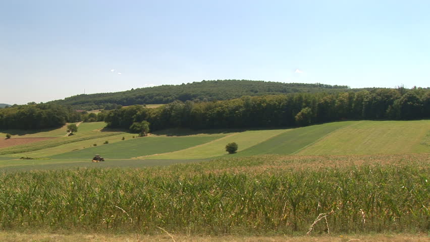 truck harvesting in wide landscape