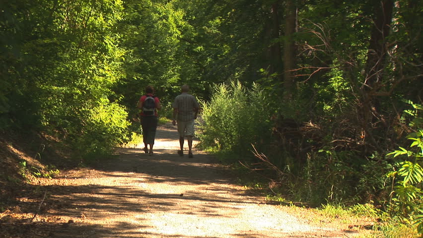 Couple Walking Down a Path