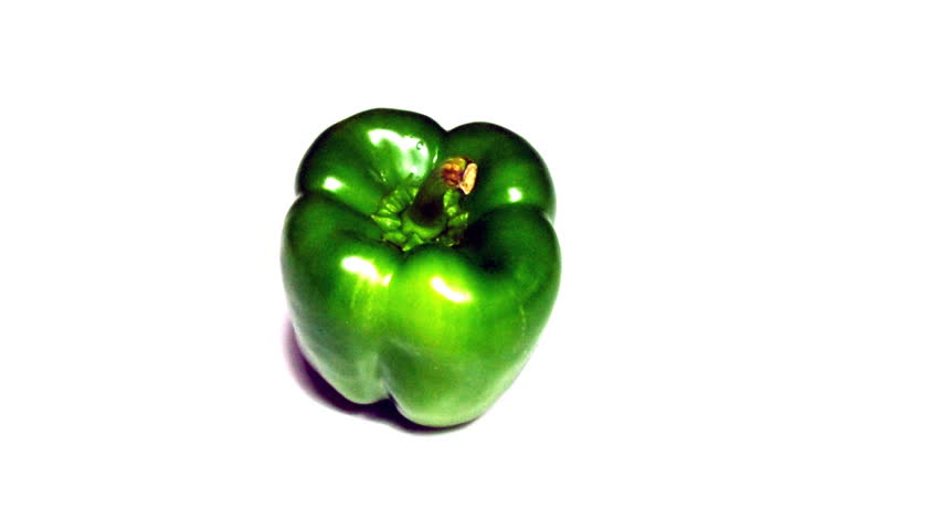 real 3D rotating green pepper isolated on white