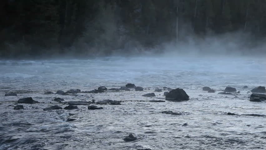 Yellowstone River with mist drifting over the water. Romantic and peaceful with a hint of mystery. 