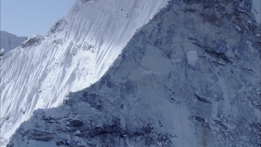 White Snow Rocky Mountain Cliff A View Of Sheer Rock Covered In Thick The Side Is Complete Shadow Peak White Snow Rocky Mountain Cliff A View Of Sheer Rock Covered In Thick The Side Is Complete Shadow Peak