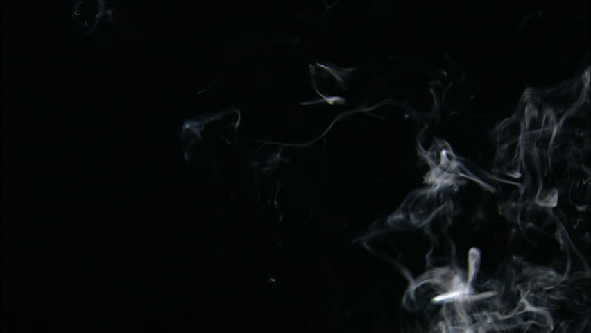 Trail of smoke on a black background.