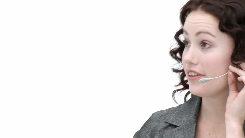Young attractive  female employee on a headset