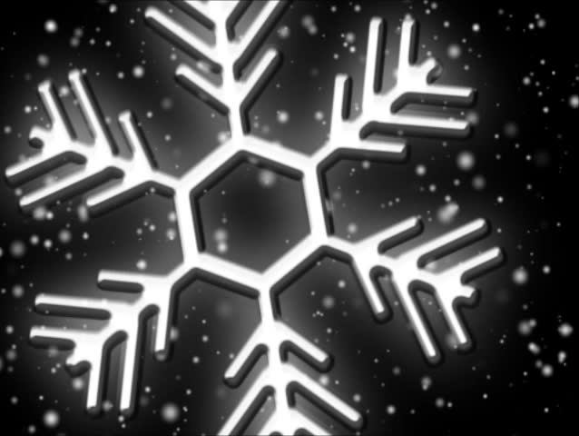 Snow flurries and big decorative flakes fall against a pitch black sky with moving clouds in seamless loop. 480p.