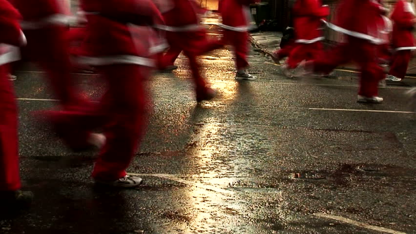 LIVERPOOL - DECEMBER 6: Thousands of runners take part in the annual "Santa Dash" for charity in December 6, 2009in Liverpool, England. 