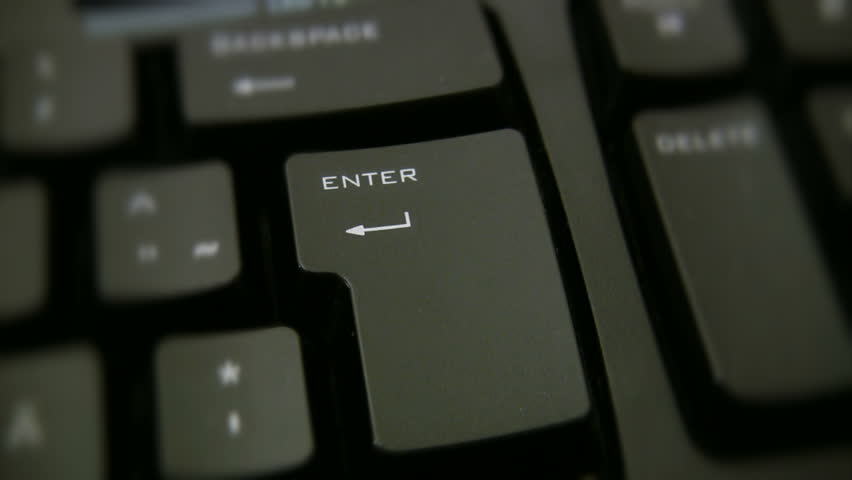 Finger pressing enter button 1