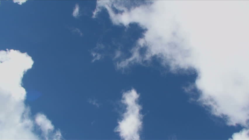 Cloud time lapse, thick clouds engulf blue sky. 1920x1080