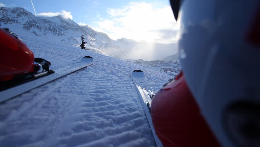 Camera mounted betweed the skis with skier in front of camera. Logos removed from Skis and boots before filming.