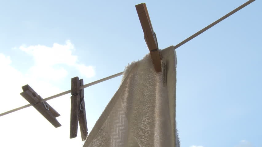 towel gently sways on clothesline