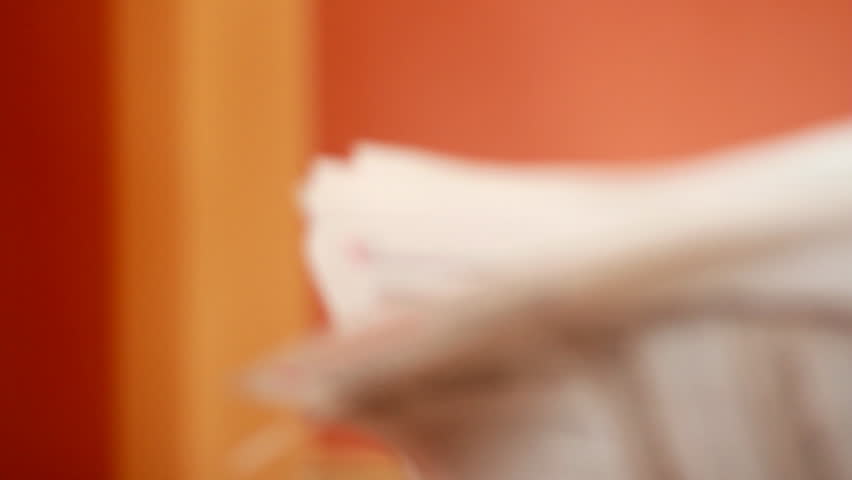 Young woman reading newspaper, Dolly shot - 1080p
