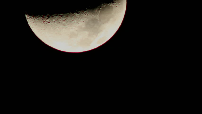Moon suspended in black night