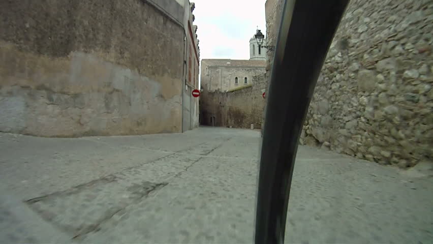 Mountain Bike ride along cobbled street