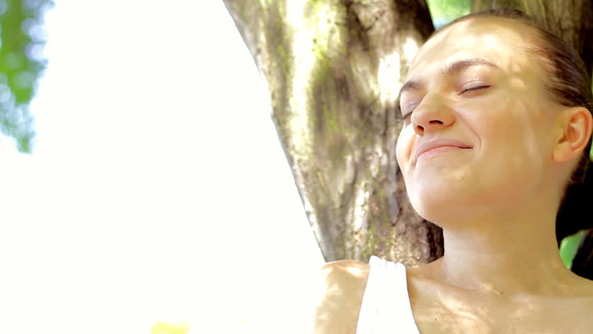 Happy woman relaxing, pan shoot - 720p
