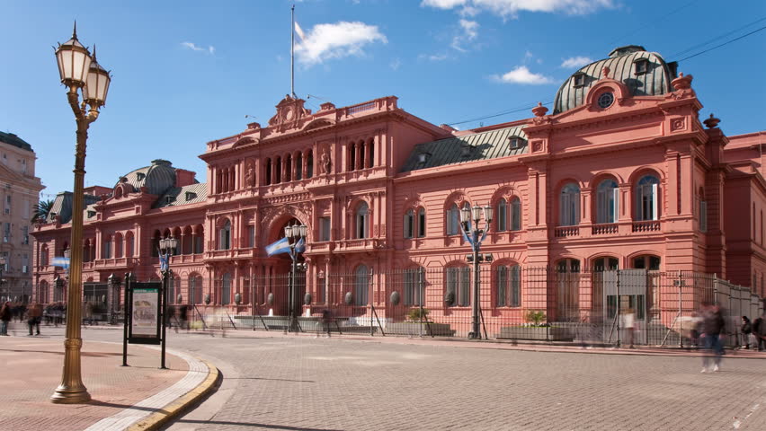 BUENOS AIRES - JULY 13: Casa Rosada, federal government building and presidential office at Plaza de Mayo square on July 13, 2010 in Buenos Aires, Argentina. Time-lapse.