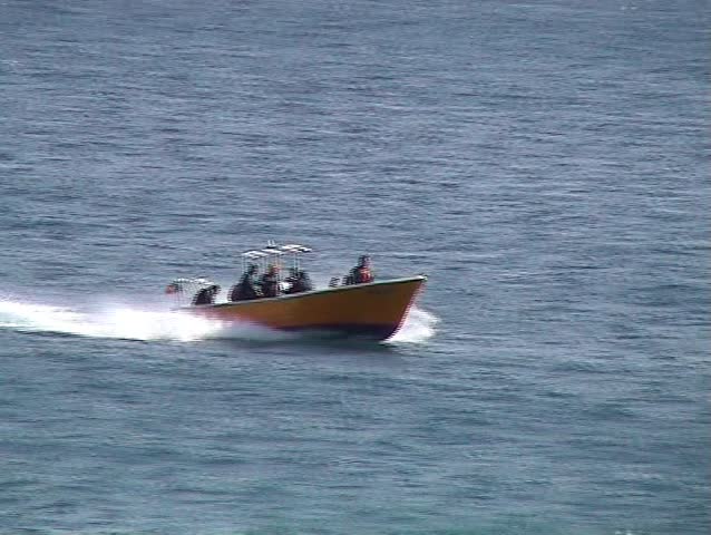 Boat running quickly at sea