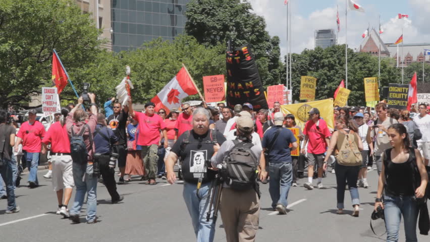 TORONTO, ONTARIO - JUNE 24th: Protesters march on June 24th, 2010, Toronto, Ontario, Canada. Native groups marched to bring attention to issues facing first Nations communities across Canada.