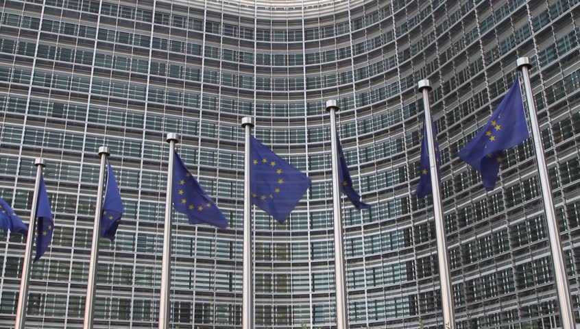 European Flags floating in front of the European Commission building in Brussels