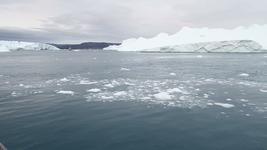 Sailing in the famous Ilulissat icefjord in Greenland. The icefjord is on UNESCO's World Heritage List.
