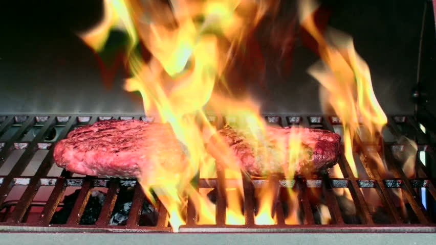 Flames consume burgers cooking on barbecue grill. 1920x1080