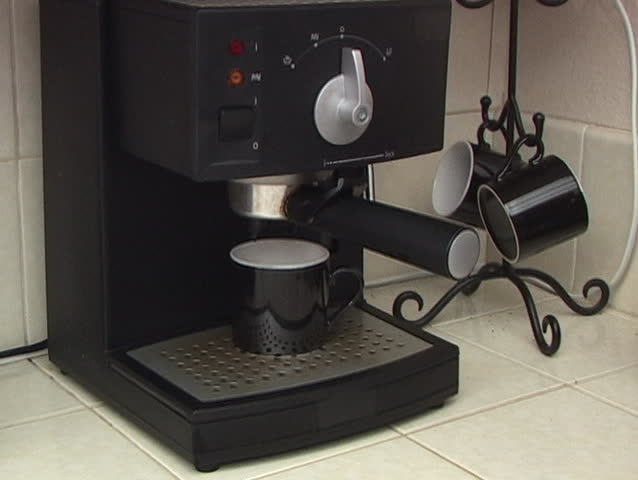 Making espresso and smelling the coffee. 