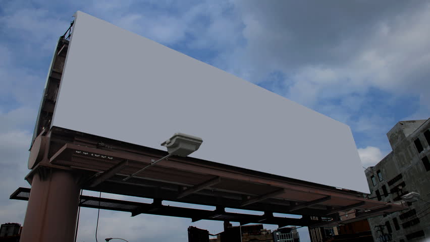 Blank billboard against clouds time lapse