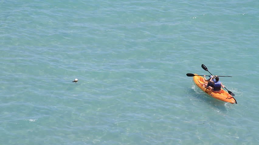 2 adventurers in a kayak