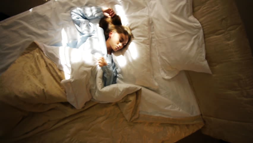 Girl waking up from sleep