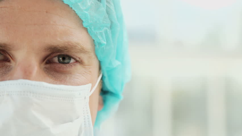 Closeup of a Male Surgeon in Scrubs