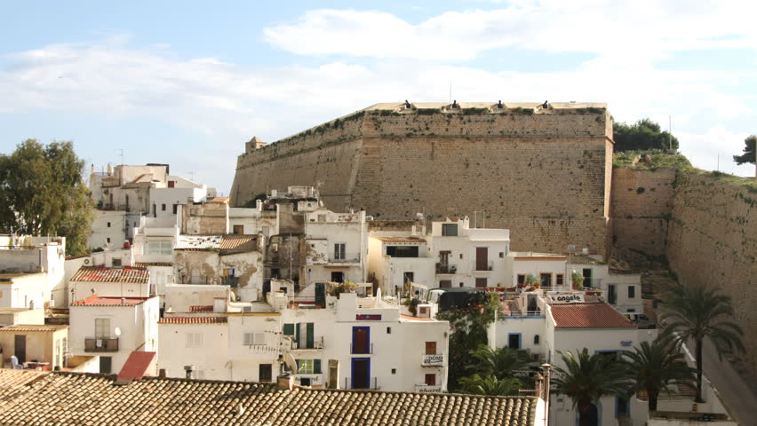 view over villas and old wall in ibiza town