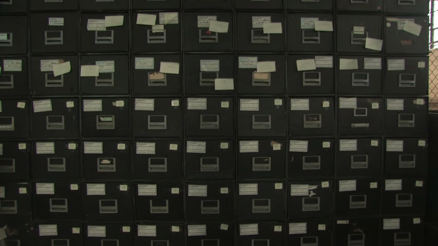 Man at File Cabinet 1