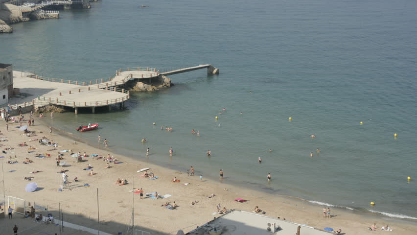 a timelapse over many hours of a beach in marseille, france