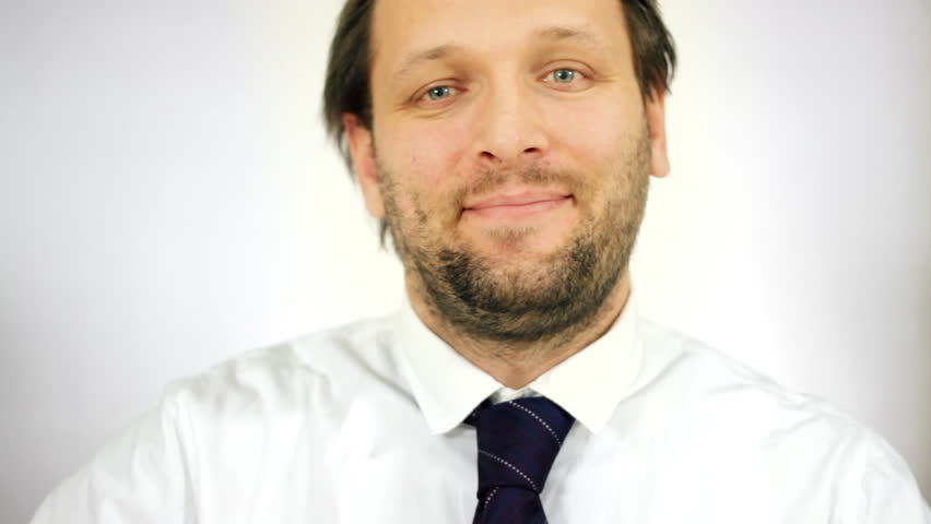 Businessman showing thumbs up, ok sign 