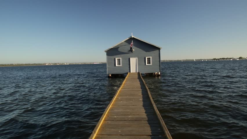 Hd00 16pov Walking On Jetty Of Blue Boat House