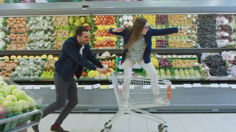 Supermarket Man Pushes Shopping Cart Woman Stock Footage Video (100%  Royalty-free) 1015805230 | Shutterstock