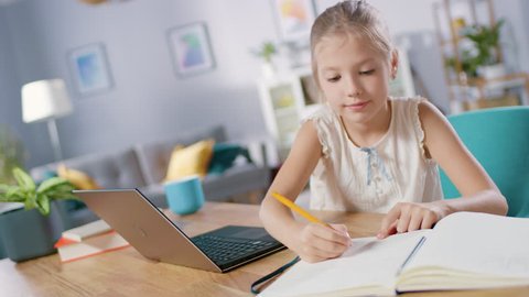 Smart Little Girl Does Homework Stockvideos Filmmaterial 100