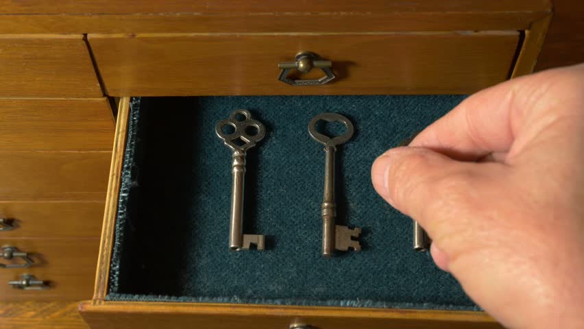 Hd00 22taking An Old Skeleton Key Out Of A Mysterious Chest Of