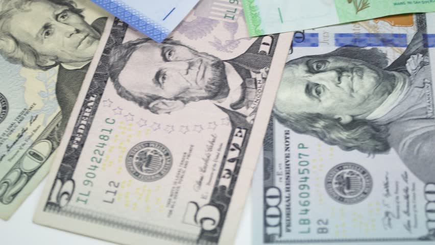 Us Dollar And Malaysia Money Stock Footage Video 100 Royalty Us Dollar And Malaysia Money On The Table Rotating 4k