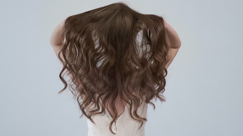 4k00 09woman Moves Long Hair Rear View Girl Shakes Long