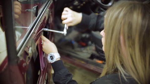 feminized girl master service the blonde working on the old car in to the mechanic for repair