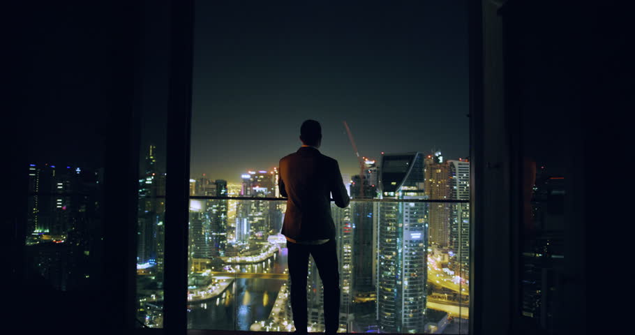 Young Entrepreneur Walkling Toward City Sky Scrapers Dubai Urban Panorama Futuristic Digital Nomad Night Downtown Slow Motion Red Epic 8k