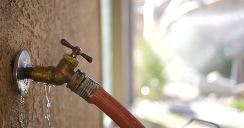 Turning Off A Leaking Hose Stock Footage Video 100 Royalty Free
