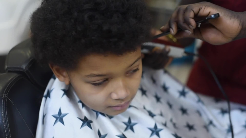Hd00 09boy In The African Barbershop Cute Mixed Boy Makes A