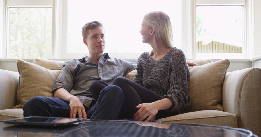Couple Talking On Couch In Stock Footage Video 100 Royalty
